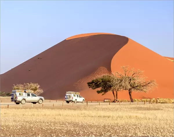 The jeep around Dune 45 composed of 5 million years of sand, Sossusvlei, Namib Desert