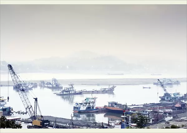 View of industrial boats on the Ayeyarwady River (Irrawaddy) river, Sagaing, Myanmar (Burma)