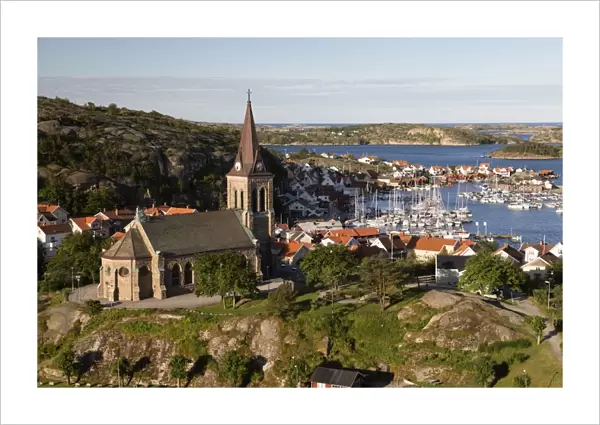 View over harbour and town with Vetteberget cliff, Fjallbacka, Bohuslan Coast, Southwest Sweden