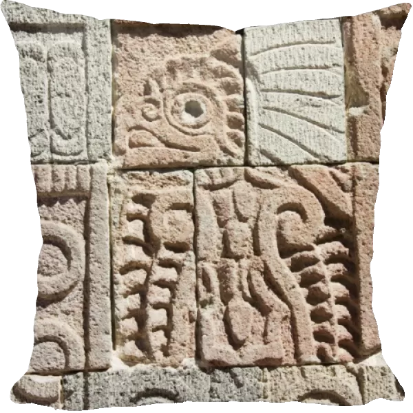 Columns depicting the Quetzal Bird