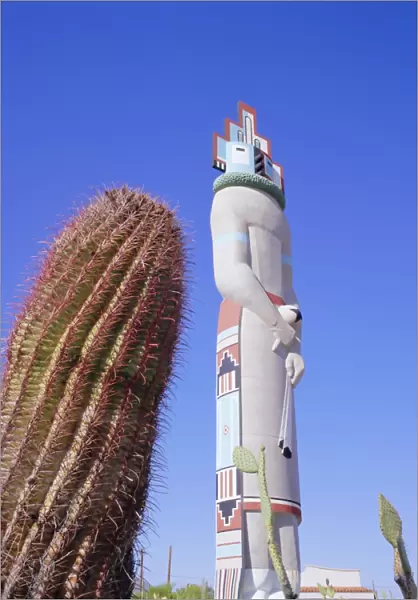 Giant cactus and Indian statue