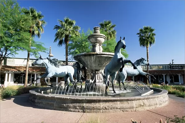 Bronze horse fountain in the up-market 5th Avenue shopping district