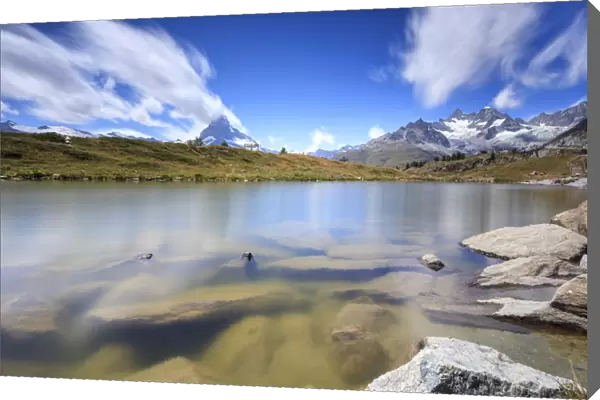 Lake Leisee frames the Matterhorn and the high peaks in the background in summer