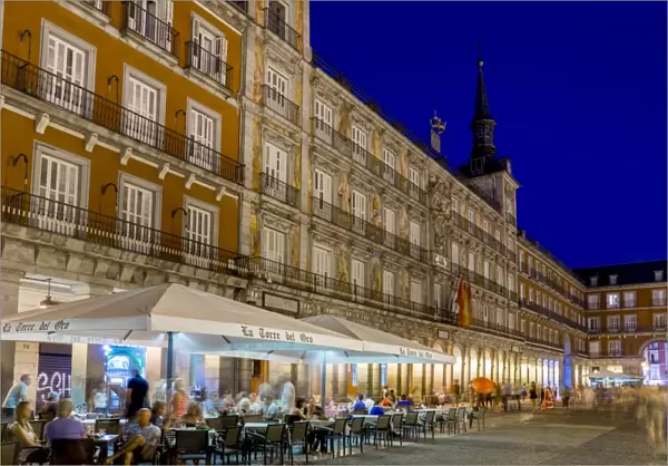 Plaza Mayor cafes at dusk, Madrid, Spain, Europe