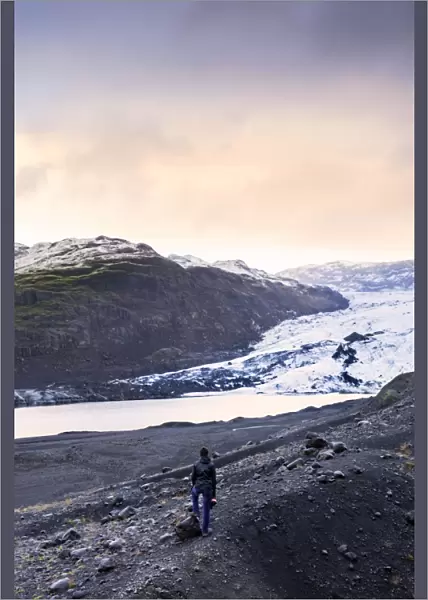 Hiker in front of the Vatnajokull glacier in Vatnajokull National Park in southeast Iceland