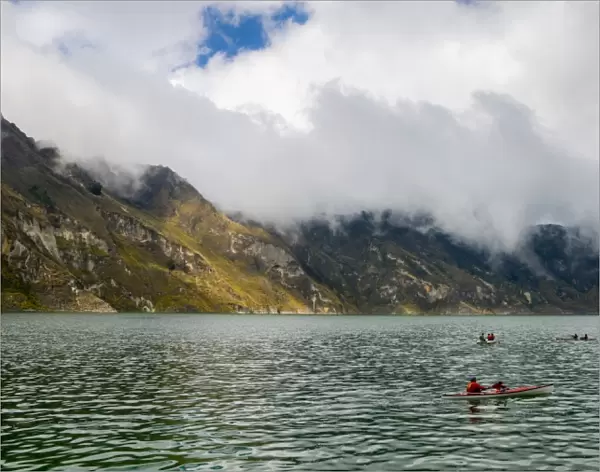 Kayaks at Quilotoa, a water-filled caldera and the most western volcano in the Ecuadorian Andes