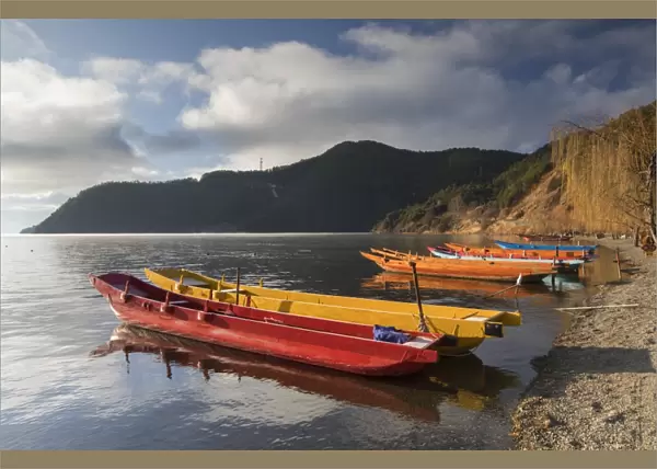 Boats on Lugu Lake, Lige village, Yunnan, China, Asia