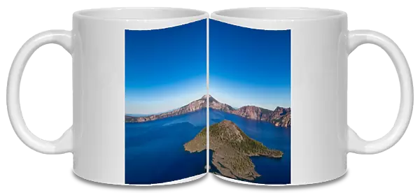 Wizard Island and the still waters of Crater Lake, the deepest lake in the U. S. A