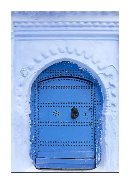 Blue door and wall in the old town of Chefchaouen (Chaouen) (The Blue City), Morocco