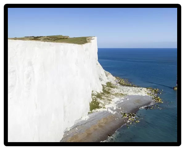 White chalk cliffs of Beachy Head and lighthouse, South Downs National Park, near Eastbourne