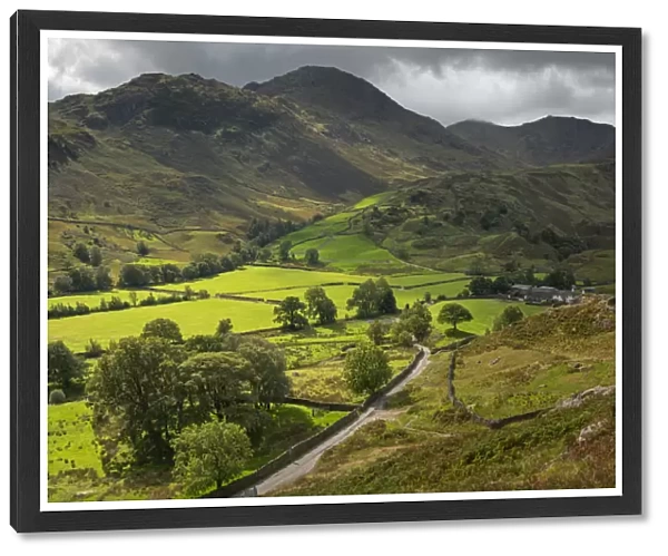Rolling farmland and mountains in Little Langdale, Lake District National Park, UNESCO