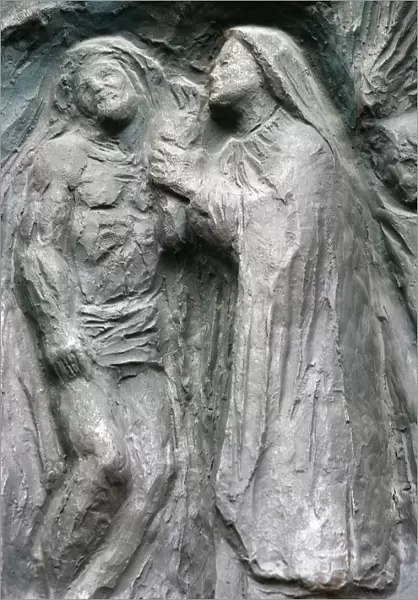 Sculpture of Jesus taken down from the cross, on the Notre Dame door