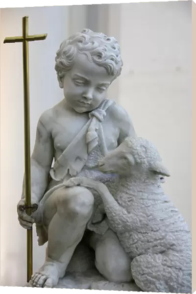 Sculpture depicting Christ as a good shepherd in Santa Maria D