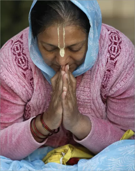 Hare Krishna devotee praying, Vrindavan, Uttar Pradesh, India, Asia