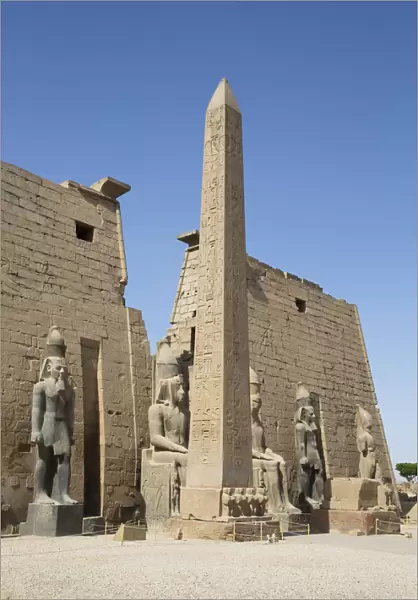 Colossi of Ramses II in front of Pylon, Obelisk, Luxor Temple, UNESCO World Heritage Site