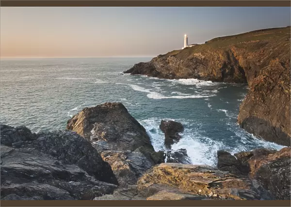 A peaceful dusk on Cornwalls Atlantic coast, showing the lighthouse at Trevose Head