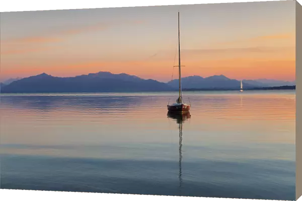 Sailing boat at sunset, Lake Chiemsee and Chiemgau Alps, Upper Bavaria, Germany, Europe