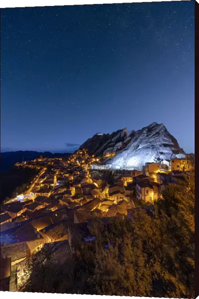 Stars in the night sky over the medieval town of Pietrapertosa, Dolomiti Lucane
