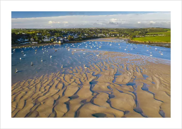 Aerial view of the Camel Estuary at low tide and the village of Rock, Cornwall, England