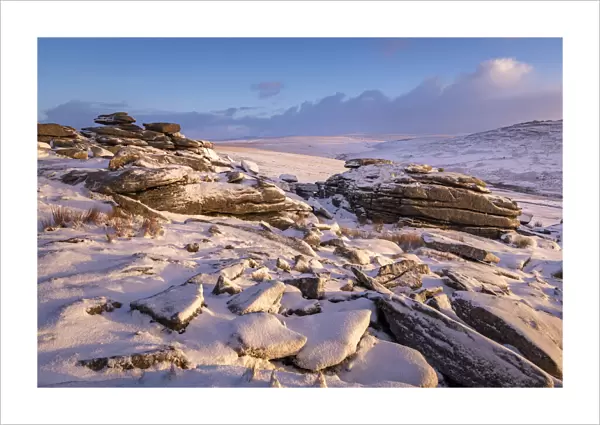 Snow covered granite outcrops on Great Staple Tor, Dartmoor National Park, Devon, England