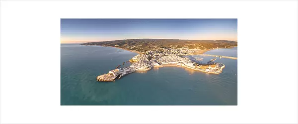 Aerial view of Vieste at sunrise in summer, Foggia province, Gargano National Park