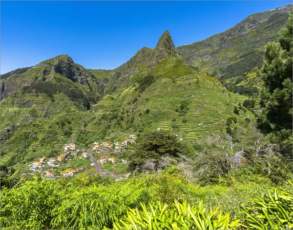 Village of Serra de Agua in the lush vegetation at feet of mountains