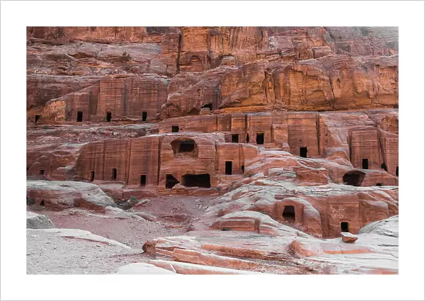 Caves carved in the stone of the mountain inside, Petra, UNESCO World Heritage Site, Jordan, Middle East