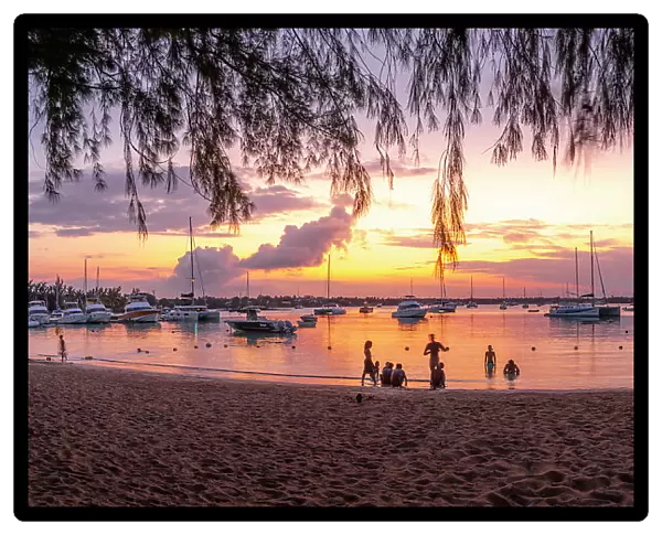 View of boats on the water in Grand Bay at sunset, Mauritius, Indian Ocean, Africa