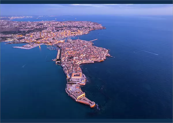 Aerial shot of Syracuse and the old city on the island of Ortigia at dawn, UNESCO World Heritage Site, Syracuse province, Ioanian sea, Sicily, Italy, Mediterranean, Europe