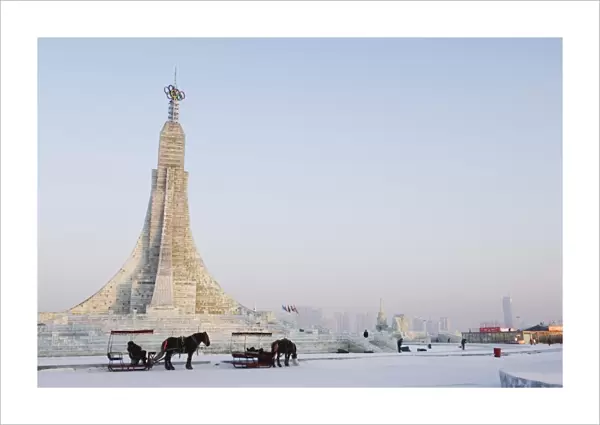 A horse and carriage and ice sculptures at the Ice Lantern Festival, Harbin