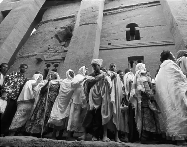 Pilgrims in front of Beth Medhane Alem monolithic church, Lalibela, Ethiopia, Africa