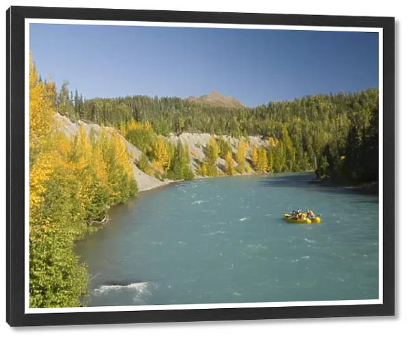 Tourists sightseeing on a raft on the Kenai River, Alaska, United States of America