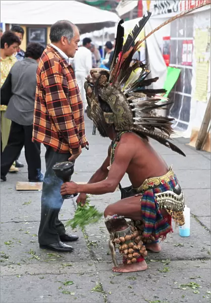 Aztec folk healer, shaman practising spiritual cleansing, Zocalo, Plaza de la Constitucion