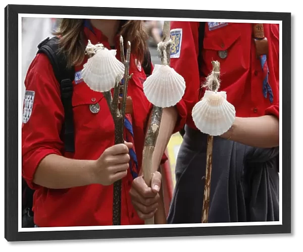 Scouts with Santiago pilgrimage scallop shells, Lourdes, Hautes Pyrenees, France, Europe