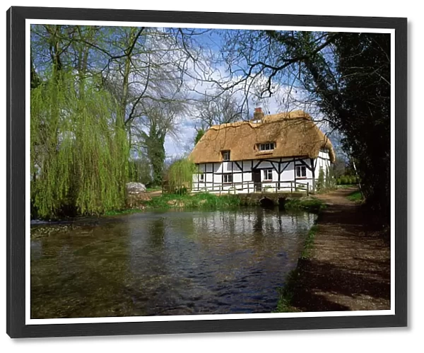 Riverside thatched cottage, New Alresford, Hampshire, England, United Kingdom, Europe