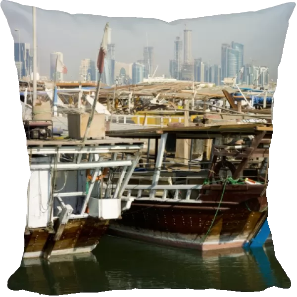 Dhows in Doha Bay and city skyline, Doha, Qatar, Middle East