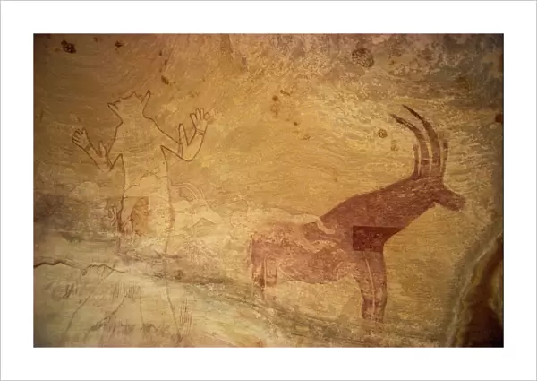 Huge painting of god figure and sable antelope on rock wall, Tassili Plateau