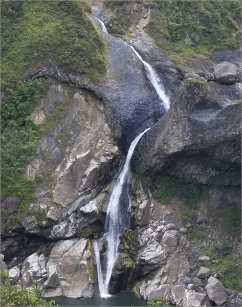 One of many picturesque waterfalls in the valley of the Rio Pastaza that flows from the Andes to the upper Amazon Basin, near Banos, Ambato Province, Central Highlands, Ecuador