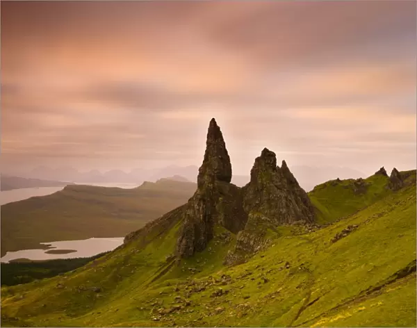 Old Man of Storr at dawn with Cuillin Hills in distance, near Portree, Isle of Skye