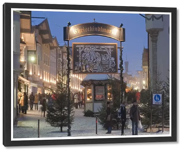 Main entrance to Christkindlmarkt (Christmas Market), Marktstrasse at twilight