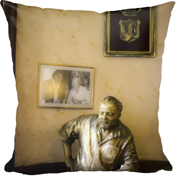 Lifesize bronze statue of author Ernest Hemingway in bar El Floridita, Havana