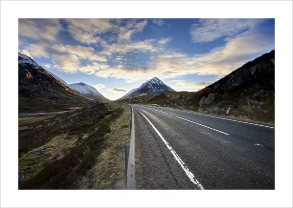 A82 trunk road heading across Rannoch Moor towards Glencoe with snow-covered mountains in distance