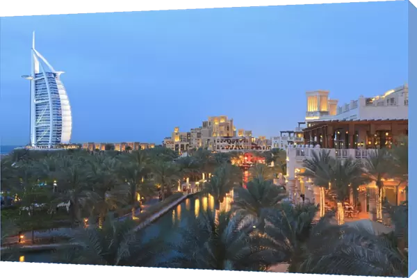 Burj Al Arab viewed from the Madinat Jumeirah Hotel at dusk, Jumeirah Beach