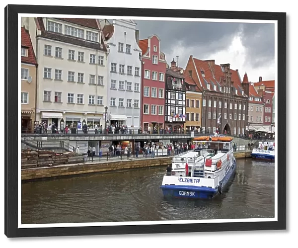 View along River Motlawa showing harbour and old Hanseatic architecture, Gdansk, Pomerania, Poland, Europe