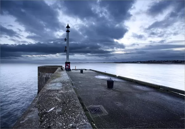 Sea wall and Harbour Light at Bridlington, East Riding of Yorkshire, England, United Kingdom, Europe