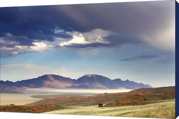 View at dusk over the magnificent landscape of the Namib Rand game reserve, Namib Naukluft Park, Namibia, Africa