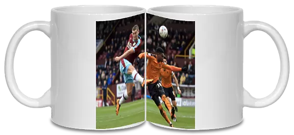 Burnley's Sam Vokes Tries to Score Past Wolves Kortney Hause in Sky Bet Championship Match