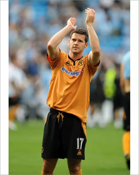 Matthew Jarvis Faces Manchester City: A Determined Moment at City of Manchester Stadium (Wolverhampton Wanderers vs Manchester City)