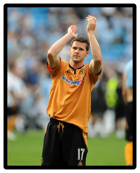 Matthew Jarvis Faces Manchester City: A Determined Moment at City of Manchester Stadium (Wolverhampton Wanderers vs Manchester City)