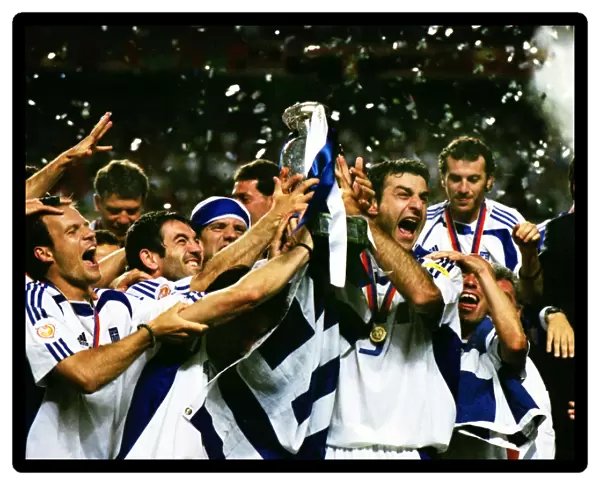 Traianos Dellas and the Greece team celebrate winning Euro 2004 Final